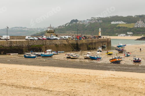 Preview: St. Ives, Cornwall, Uk - 02 May 2014: St Ives Harbor Beach. Boats On The Beach At Low Tide.