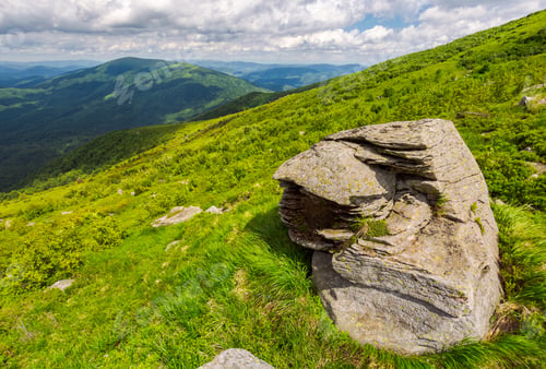 Preview: Huge Rocks On The Grassy Mountain Side. Wonderful Summer Landscape