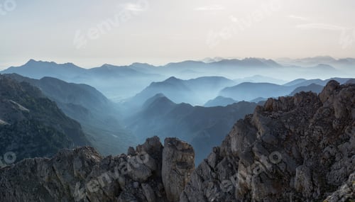 Preview: Hazy View Of The Mountains From Mount Stenar In Slovenia In Julian Alps.