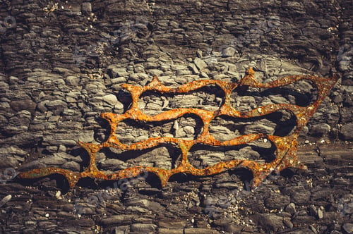 Preview: Very Rusty Metal On A Gray Cracked Rock