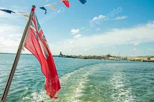 Preview: Union Jack Flag Waving From A Boat In The Ocean.