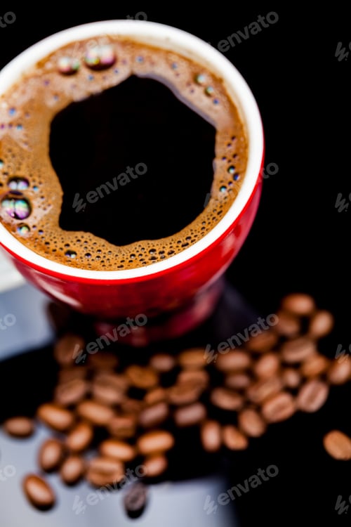 Preview: Red Cup Of Coffee With Coffee Beans And Dark Background