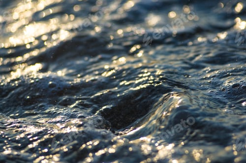 Preview: Pebble Stones On The Sea Beach On A Warm Summer Day, The Rolling Waves Of The Blue Sea With White