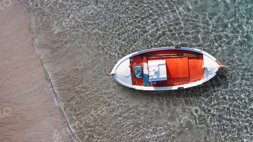 Preview: Aerial Drone Top View Photo Of Red Wooden Traditional Fishing Boat In Turquoise Sea Shore Of