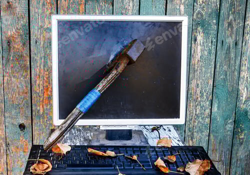 Preview: Axe To Smash A Computer Screen On The Old Planks Background