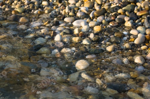 Preview: Pebble Stones On The Sea Beach, The Rolling Waves Of The Sea With Foam