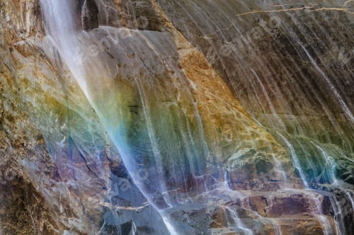 Preview: A Telephoto Shot Of Water Being Deflected By A Rock In The Upper Yosemite Falls, With A Rainbow