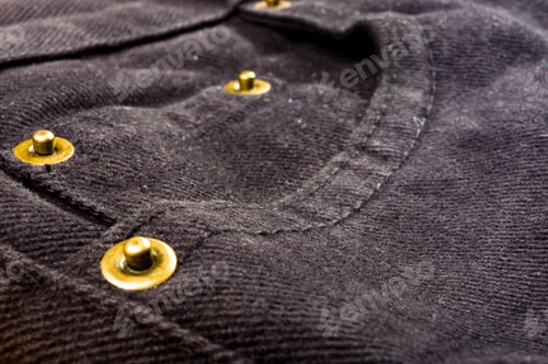 Preview: Clothing Items Washed Cotton Fabric Texture With Seams, Clasps, Buttons And Rivets, Macro, Close-Up