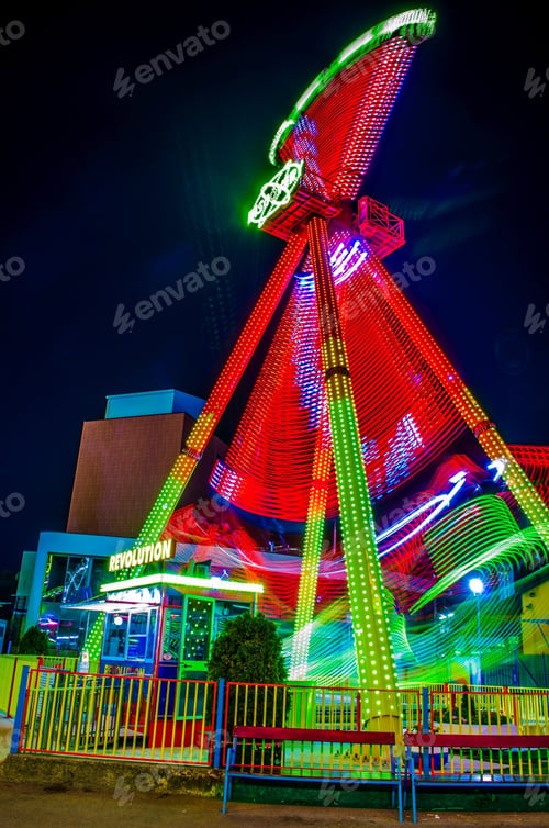 Preview: Night Shot Of The Illuminated Prater Amusement Park In Vienna Which Captures Light Trail Of An