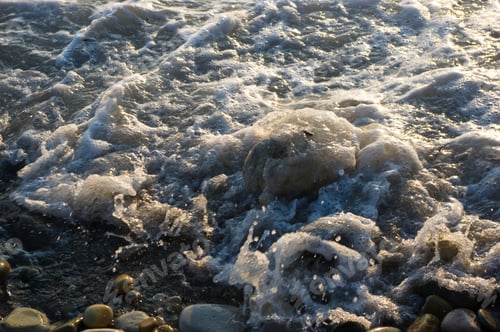 Preview: Pebble Stones On The Sea Beach, The Rolling Waves Of The Sea With Foam