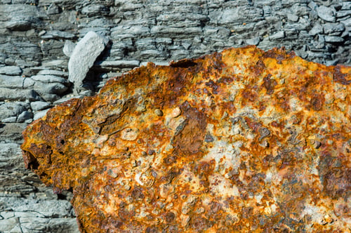 Preview: Very Rusty Metal On A Gray Cracked Rock