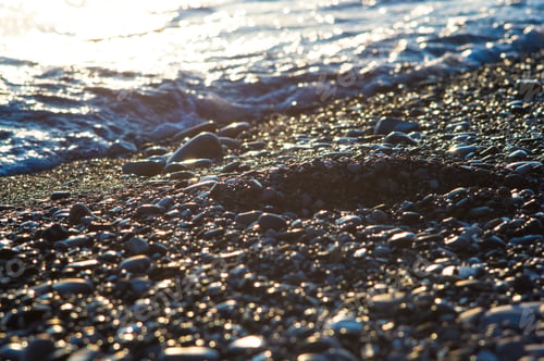 Preview: Pebble Stones On The Sea Beach, The Rolling Waves Of The Sea With Foam