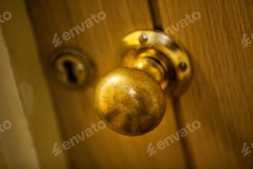 Preview: Golden Door Knob On Wooden Doors