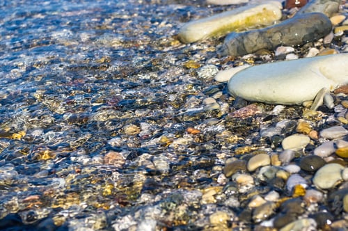 Preview: Sea Pebble Beach With Multicoloured Stones, Transparent Waves With Foam, On A Warm Summer Day