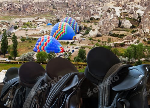 Preview: Cappadocia Balloon Tour. Rider Leather Saddles On Fence Hot Air Ballooning In Cappadocia, Turkey.