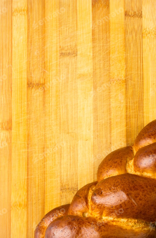 Preview: Chunks Large Braided Loaf On Wooden Background