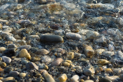 Preview: Pebble Stones On The Sea Beach, The Rolling Waves Of The Sea With Foam