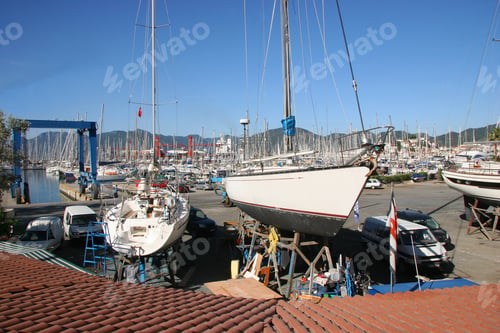Preview: Yachts Docked On The Quay Of A Marina For Maintenance