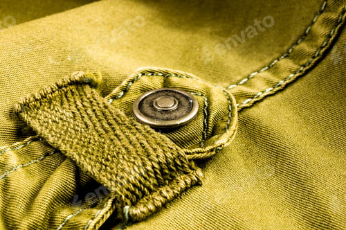 Preview: Clothing Items Stonewashed Cotton Fabric Texture With Seams, Clasps, Buttons And Rivets, Macro