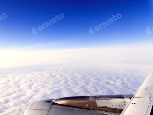 Preview: The Bright Blue Sky With White Clouds. Plane View From The Window