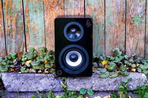 Preview: Loudspeaker Box On The Weathered Wooden Planks Background