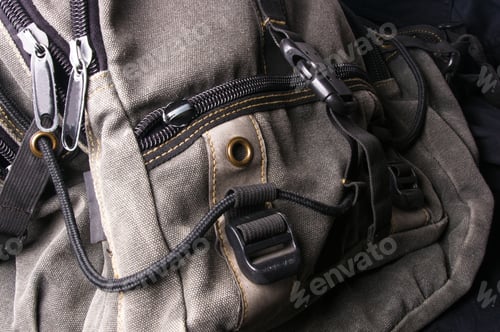 Preview: Closeup Of Buckles, Clasps, Zippers, Pockets, Fasteners, Fittings And Seams In The Brown Backpack