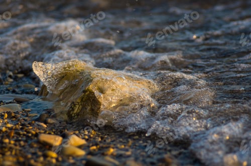 Preview: Pebble Stones On The Sea Beach, The Rolling Waves Of The Sea With Foam