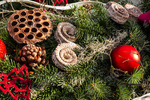 Preview: Christmas Background With Toys, Cake And Fir-Cones On Fir Tree Branches With Shallow Depth Of Field