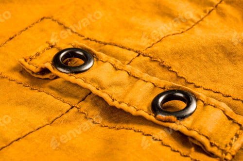 Preview: Clothing Items Washed Cotton Fabric Texture With Seams, Clasps, Buttons And Rivets, Macro, Close-Up