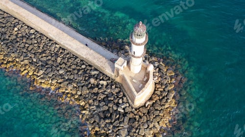 Preview: Aerial Drone Photo Of Iconic Venetian Lighthouse In The Entrance Of Picturesque Old Port Of Chania