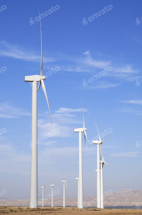 Preview: Windmills Group With Cloudy Sky