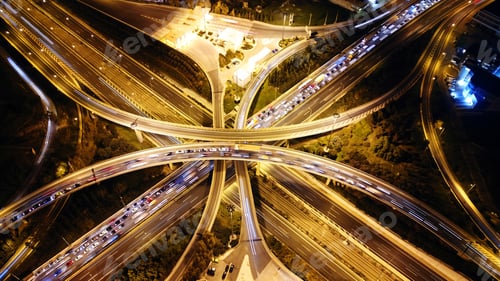Preview: Aerial Drone Slow Shutter Night Shot Of Urban Elevated Toll Road Junction And Interchange Overpass