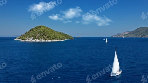 Preview: Aerial Drone Photo Of Beautiful Sail Boat With White Sails, Sailing Open Ocean Deep Blue
