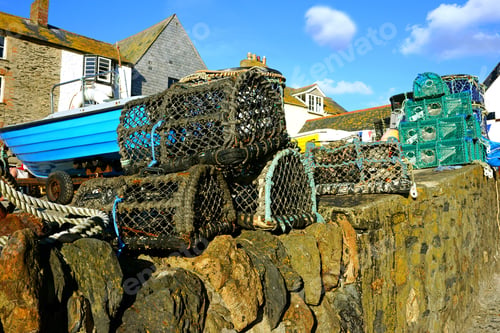 Preview: Lobster Pots On A Fishing Harbor Wall, Port Isaac, Cornwall, United Kingdom.
