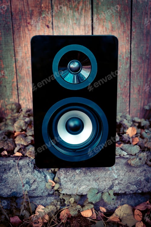 Preview: Loudspeaker Box On The Weathered Wooden Planks Background