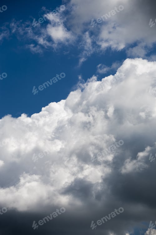 Preview: Beautiful, Fluffy, White And Grey Clouds And Blue Sky