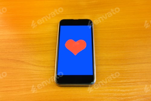 Preview: Heart Shape And Cellphone On The Wooden Background
