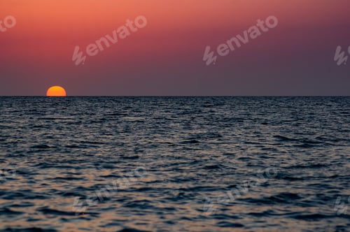 Preview: Amazing Sea Sunset On The Pebble Beach, The Sun, Waves, Clouds
