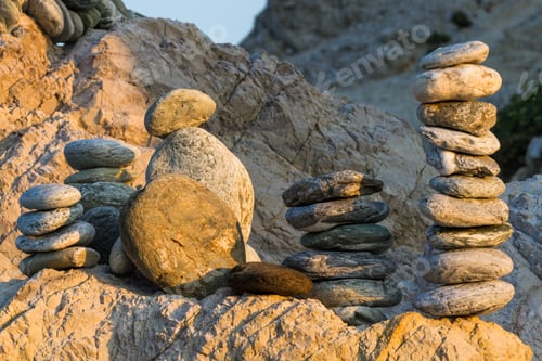 Preview: Stones Pyramides On The Beach In Sunset