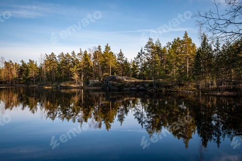 Preview: Colorful Sunset On The Lake With Water Reflections And Dramatic Storm Clouds Above. Late Evening