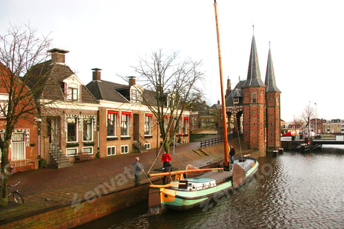 Preview: Sailors Moving Historical Boat At Quay Near Water Gate Entrance Of Fortified City