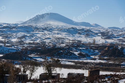 Preview: Winter Scene With Volcanic Mountains And Village