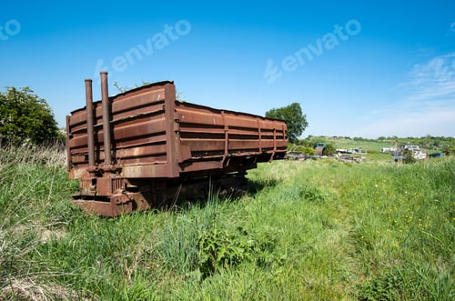 Preview: Rusty Metal Trailer In A Field