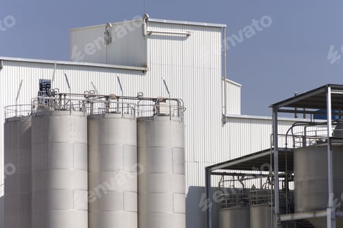 Preview: View Of Huge Metal Tanks In An Industrial Area