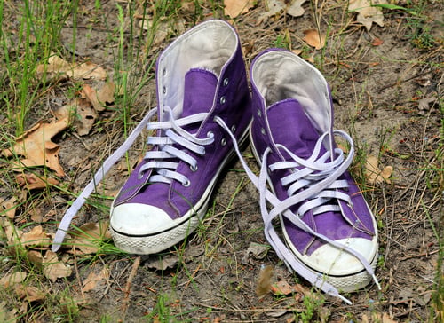 Preview: Pair Of Gymshoes On Soil In Forest