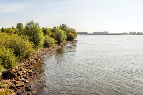 Preview: Stones On The Waterfront Of The Dutch River Waal Near The Village Of Vuren, Gelderland. Many Stones