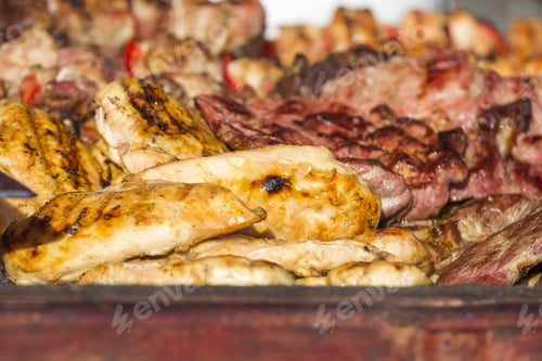Preview: Different Kind On Grilled Meat And Sausages With Smoke And Steam From The Grill
