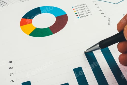 Preview: Businessman Showing A Diagram On A Financial Report Using A Pen