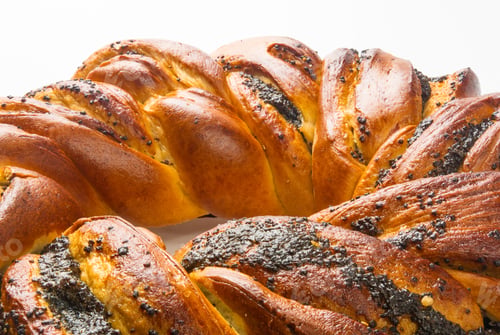 Preview: Braided Poppy Seed Round Loaf On White Background