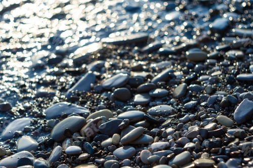 Preview: Pebble Stones On The Sea Beach, The Rolling Waves Of The Sea With Foam